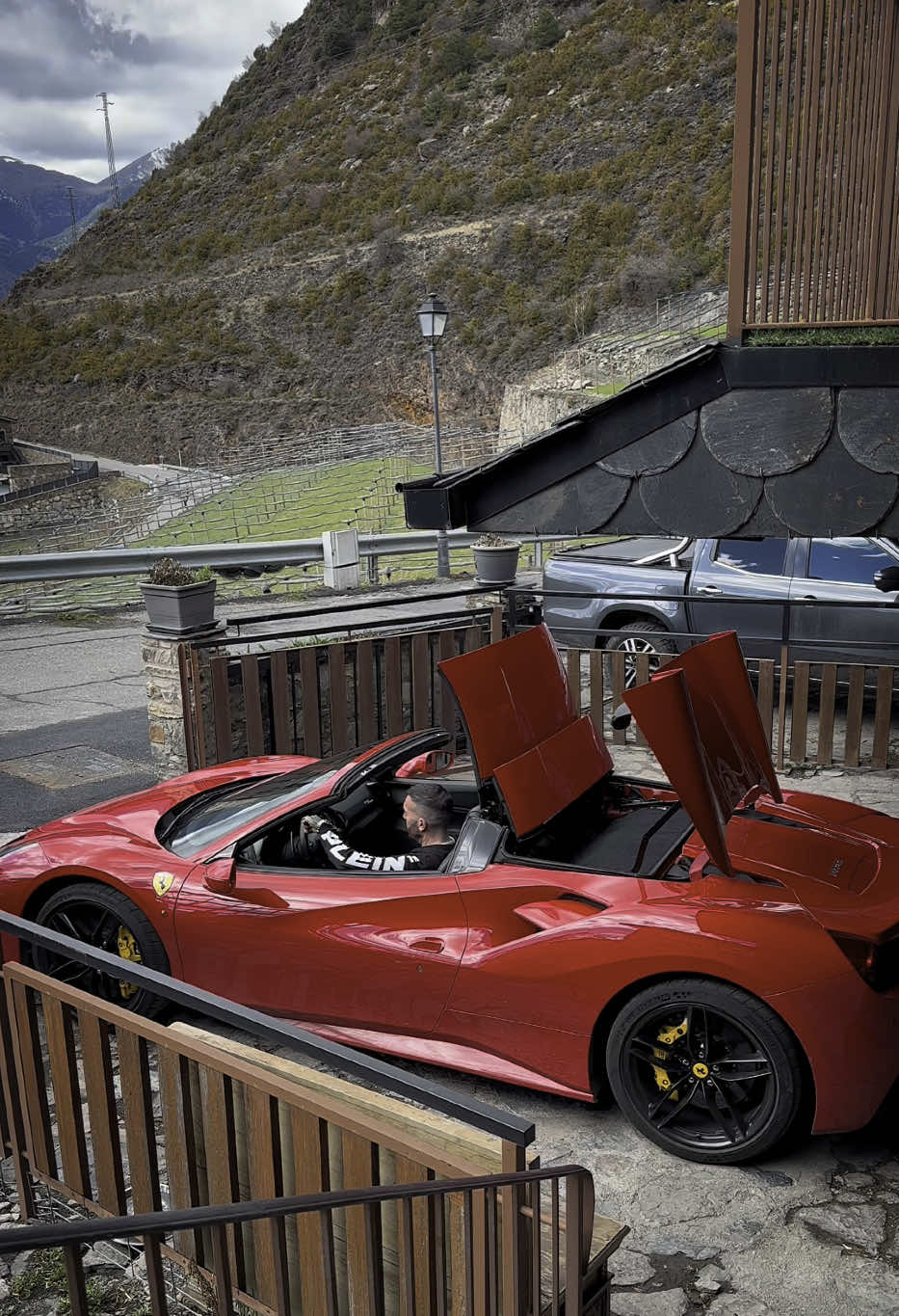 A post by @xavi.caballol on TikTok caption: Cuenta la leyenda que existió en Andorra una criatura roja que desafió a reyes y nobles… #cars #coche #paisaje #vistas #montaña #andorra #supercar #naturaleza #ferrari