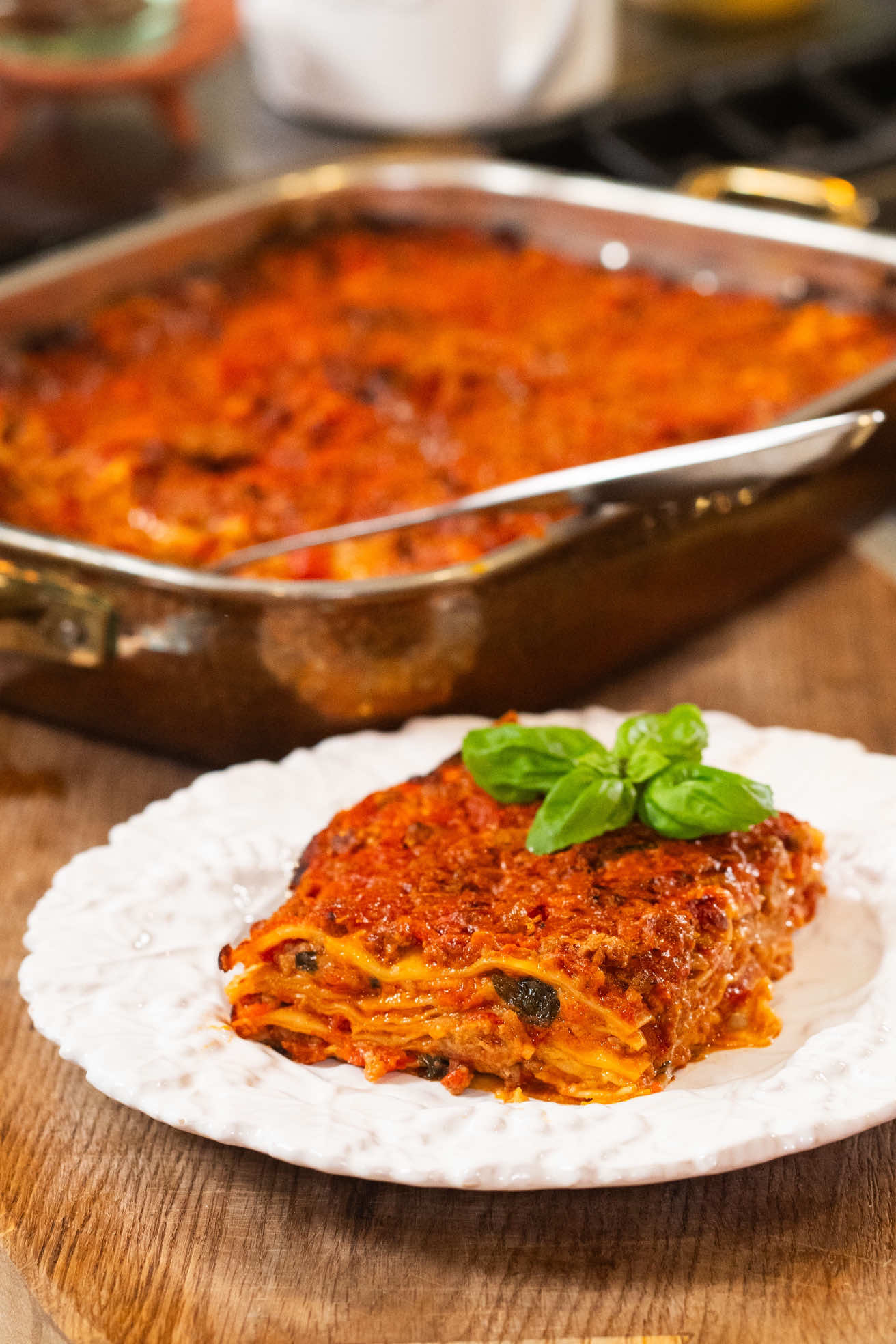 A post by @the_pastaqueen on TikTok caption: If there’s one recipe that makes my whole family happy, it’s the classic Lasagna! For the full written recipe join The Royal Court of Pasta, link in bio ✨