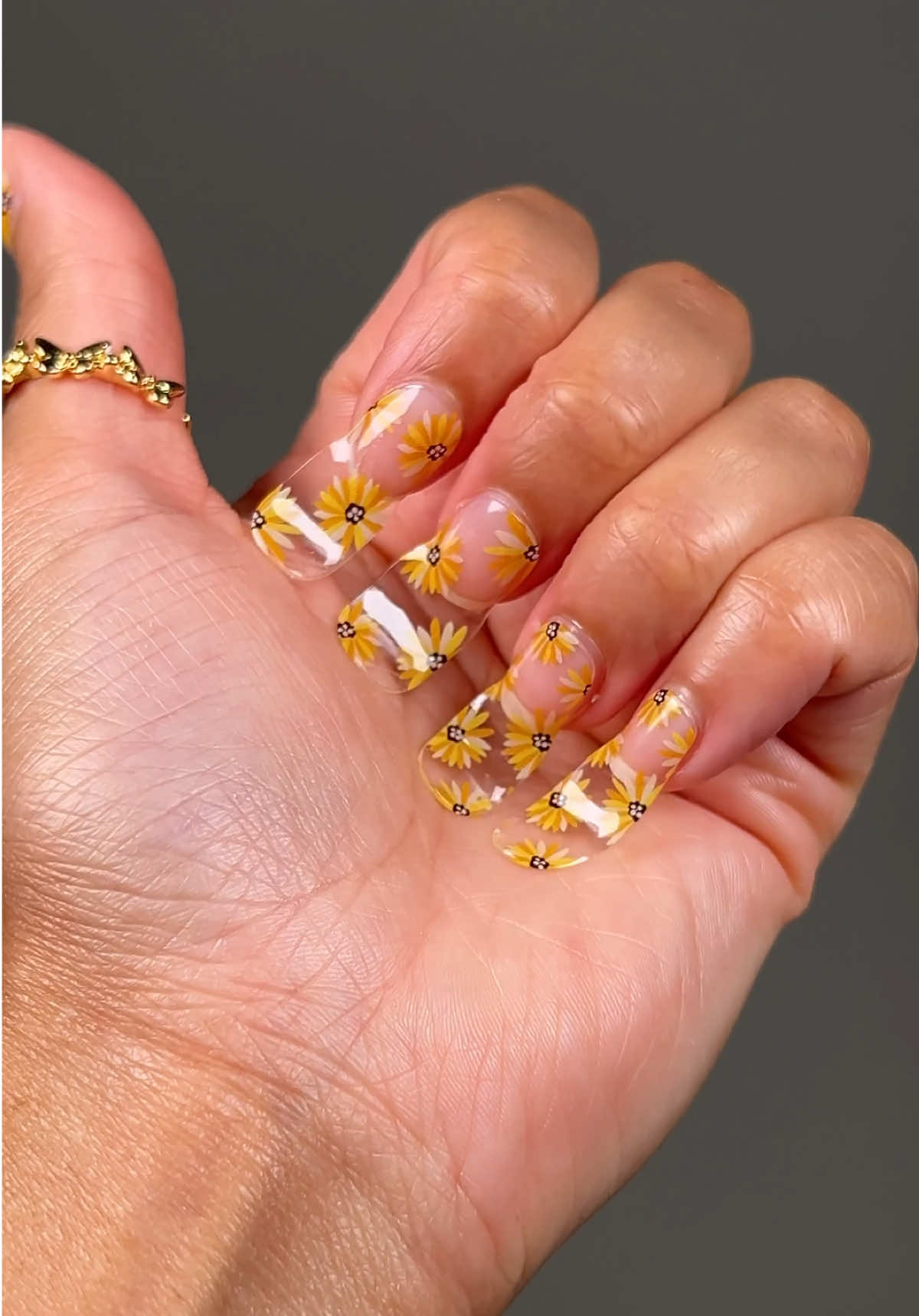 A post by @galorase on TikTok caption: Gel name: Sunflower Fields 🌻 Our gel nail strips simplify the process of doing your nails. Just stick them on and cure! 💅 It saves you money and a trip to the salon ⏰ ✨ Easy to apply & remove ✨ Lasts 2-3 weeks ✨ Odorless ✨ Non-damaging ✨ Semi-cured gel nail strips ✨ Affordable Get your own gel strips by going to the lenk in BlOO 🥰 Before they sell out again!  #gelnailsathome #gelnails #satisfying #asmr #summernails #gelnailsticker #usa 