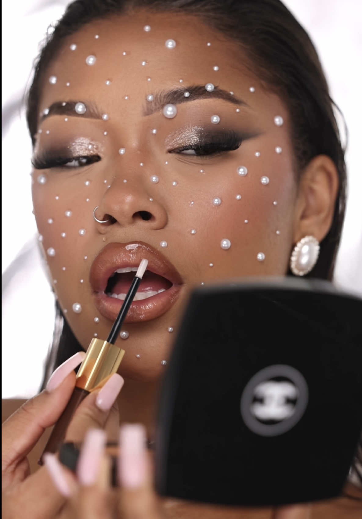 A post by @leilanigreen on TikTok caption: CHANEL BEAUTY IN HUMAN FORM 🤍 #makeupbrandsinhumanform #makeuptransition @chanel.beauty 