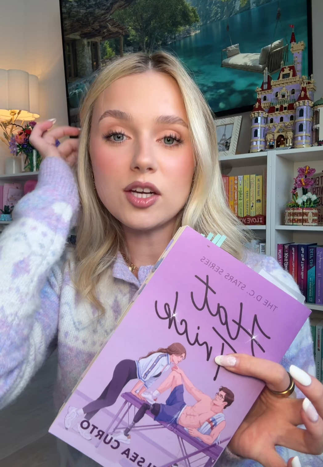 A post by @yannareads on TikTok caption: Reading slump: 10000, Yana: 1 🤓 #BookTok #books #tbr #romancebooks #hattrick #hockeyromance 