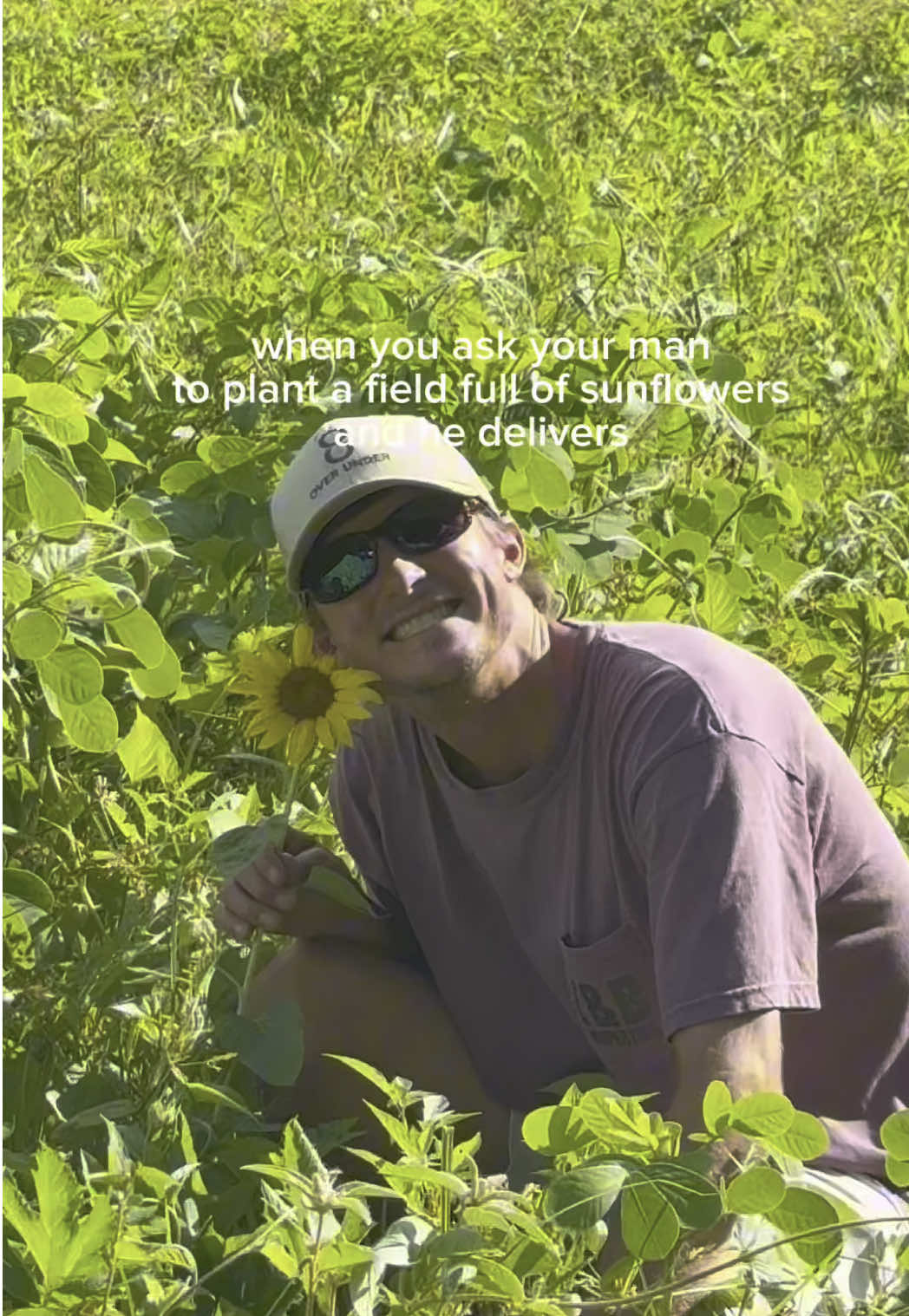 A post by @courtneymoseley_ on TikTok caption: $2k later and a wholeeee lot of prep work, one sunflower produced 🤣🤣🤣 in his defense, it’s rained nearly everyday since he planted them. ☠️ #farmer #husband #sunflower #fyp #CapCut 