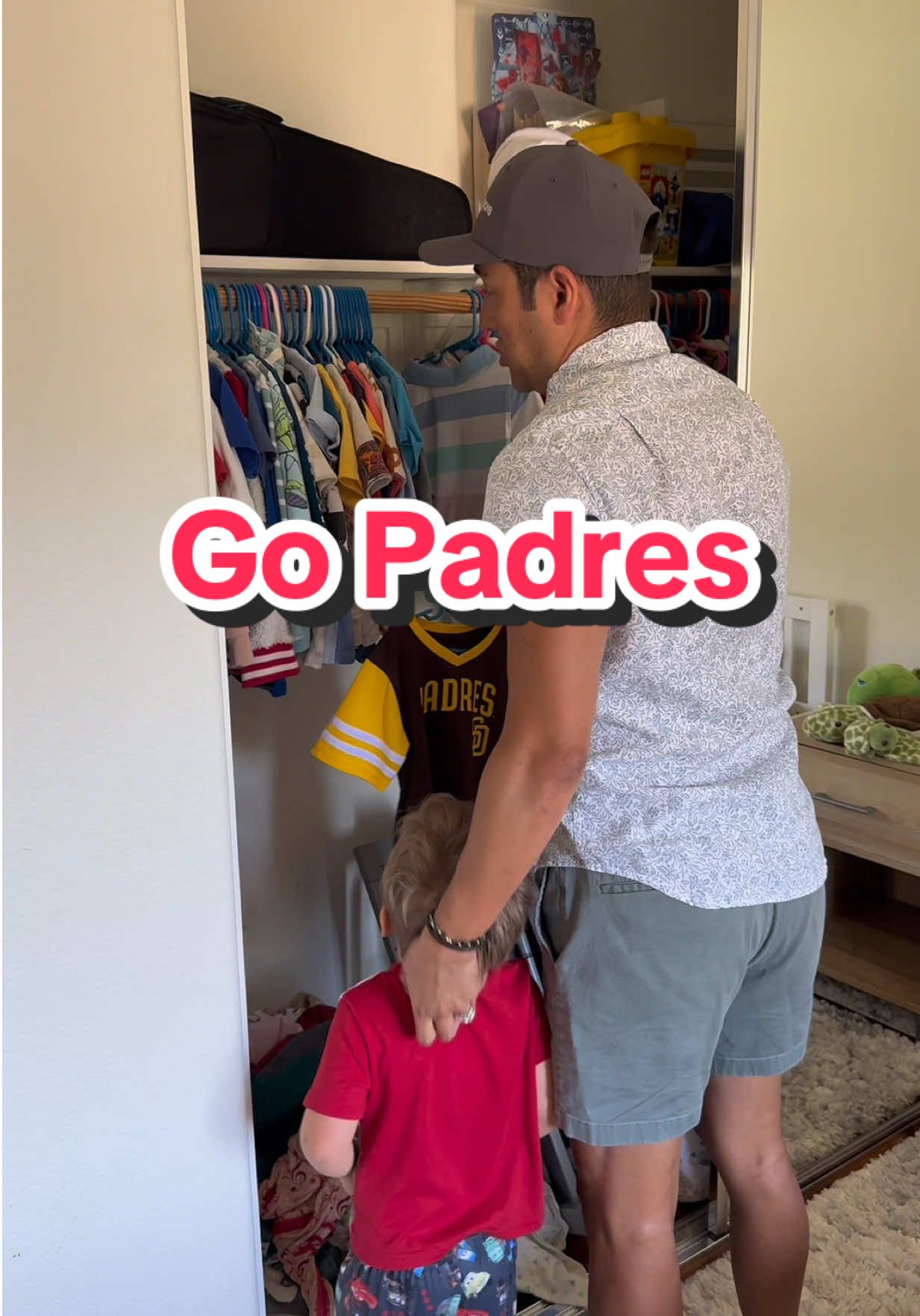 A post by @athomewithbryan on TikTok caption: I love how quickly he knew what he wanted to wear. So decisive. #brunch #padres #toddlerfashion #decisive #athomewithbryan 