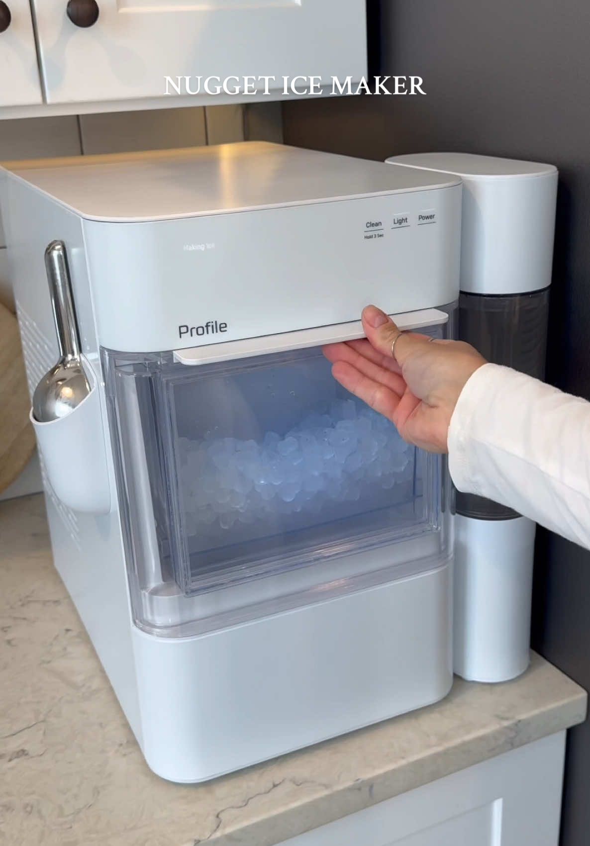 A post by @melissa_fakler on TikTok caption: This is your sign to get a nugget ice maker 🧊✨  #icemaker #icemachine #nuggetice #asmr #asmrsounds #home #kitchengadgets 