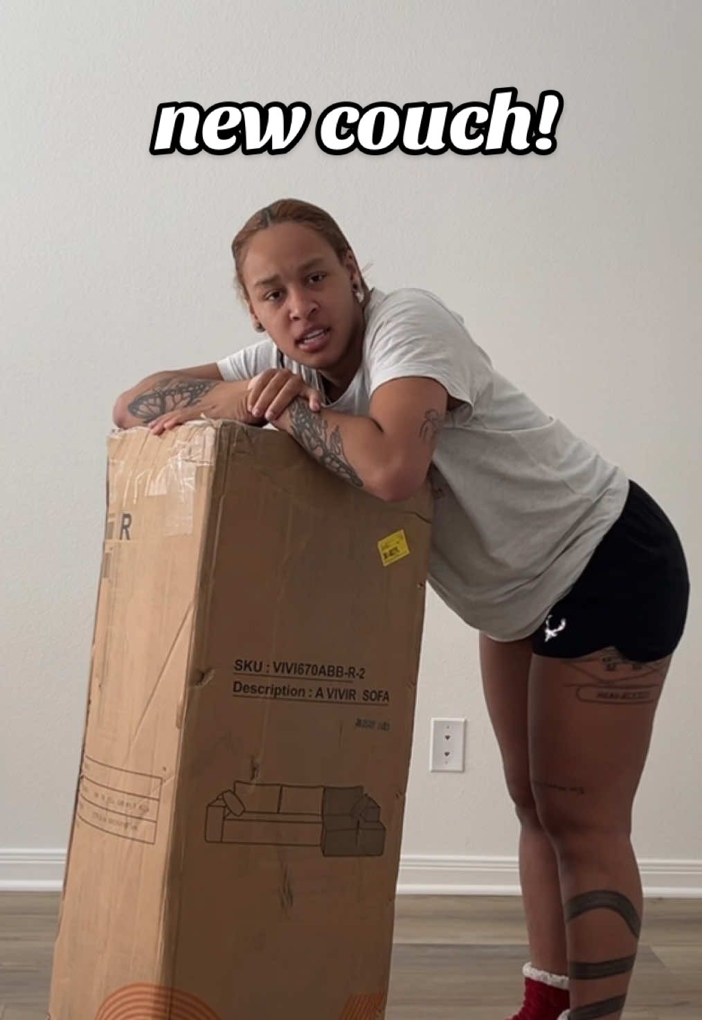 A post by @summbasic on TikTok caption: i bought a couch for my living room!