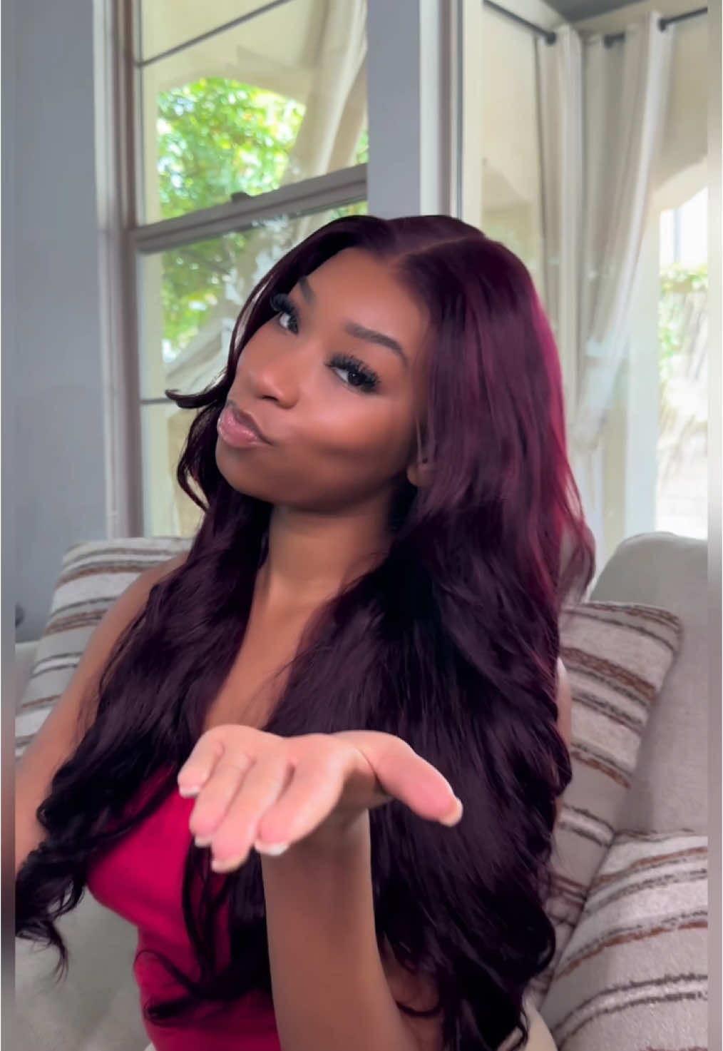 A post by @unice_amazonstore on TikTok caption: Dance with me, slay all day with my black cherry loose wave wig 👏✨💃 #unicehair #uniceamazon #fy #blackcherrywig #wiginstall #wigstyling #amazonfinds #amazonwigreview #loosewavewig #humanhair 
