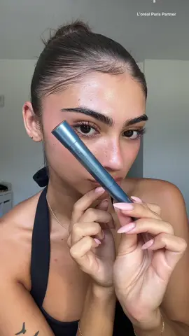 A post by @bellarmrz on TikTok caption: @loréal paris usa Telescopic Waterproof Mascara never lets me down 🌊✨🌺 #LOrealParisPartner #LOrealParisMakeup