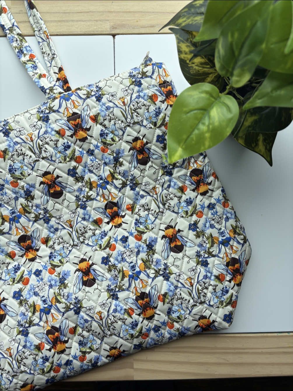 A post by @themindfulmama_ on TikTok caption: the cutest tote bag for B.🤭 Loving my new homeschool tote bag from Vera Bradley.✨🐝💙🍯 #verabradley #beegarden #verabradleytotebag #homeschoolbag #verabradleygirls 