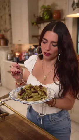 A post by @the_pastaqueen on TikTok caption: This recipe is called Roman Holidays: Pesto & Guanciale Pasta… it’s eternally gorgeous, just like Rome - and just like you ✨