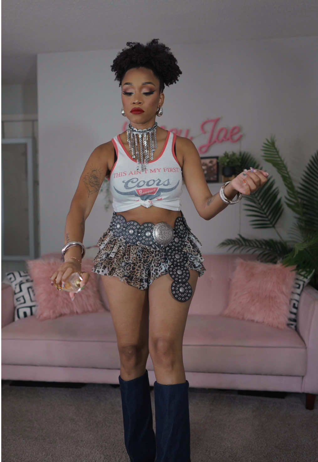 A post by @ on TikTok caption: Actually… I’m not over this outfit and I WILL be adopting western fashion into my everyday wardrobe 🙂‍↕️🫶🏽 These boots were a huge highlight. They’re archive @ZARA but I found them on @Poshmark so check out my LTK to see if you’re lucky ✨ Top: @windsorstore  Belt & shorts: @AKIRA  Choker: custom made from YEARSSS ago Bracelets: @Boho Gal Jewelry & @SHEINUS  Earrings: @Amazon #cowboycarteroutfit #getdressedwithme #cowboycarter 