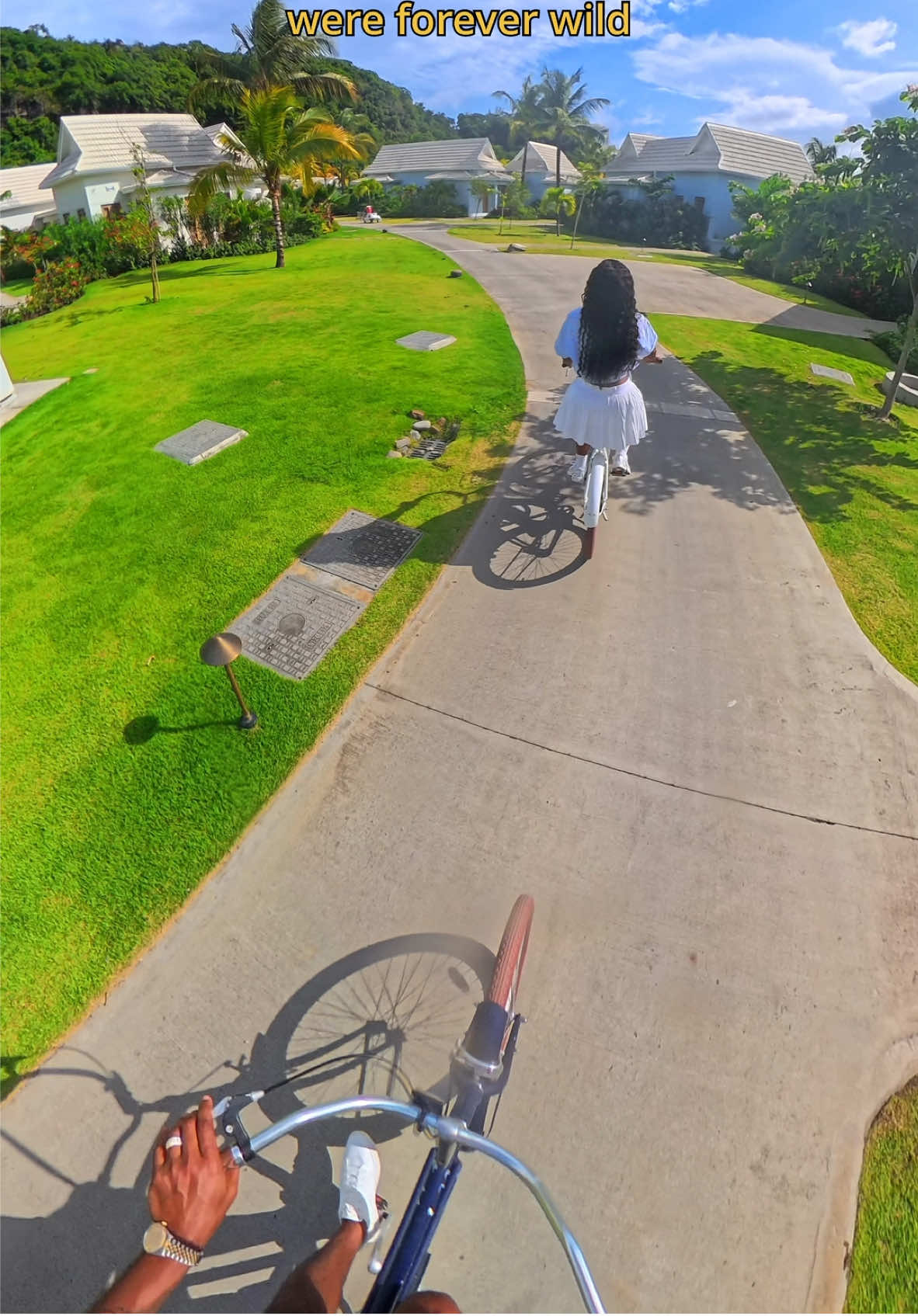 A post by @summerreignhenning on TikTok caption: “You look happier” -Thanks, I’m riding bikes in St. Vincent with Mountain views at an all inclusive resort celebrating 3 years of being married to my best friend ❤️