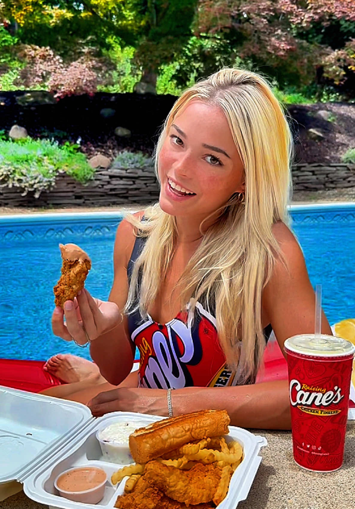 A post by @livvy on TikTok caption: Don’t be a chicken, take a dip @Raising Cane's #caniacambassador