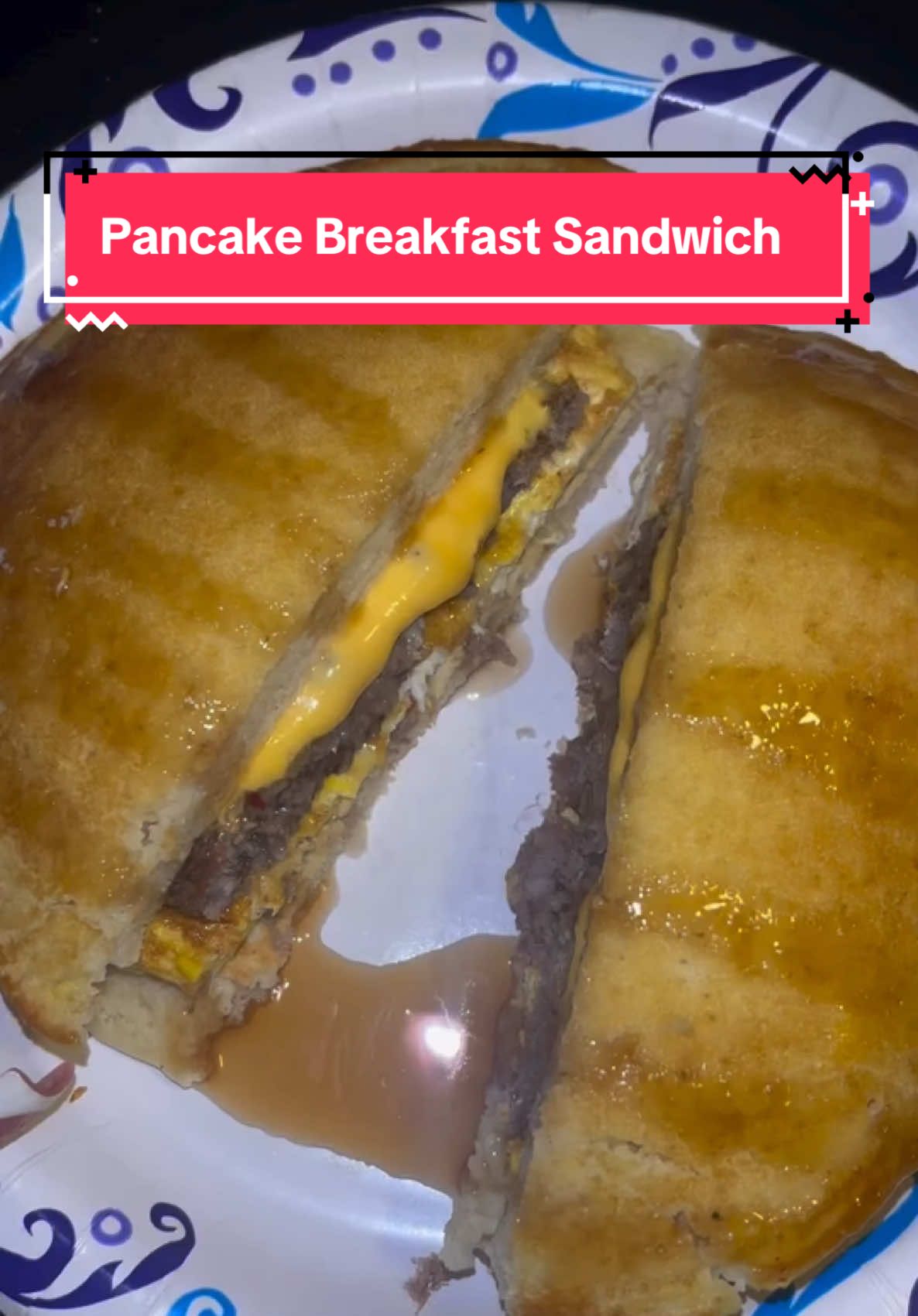 A post by @blackfoodiefinder on TikTok caption: Big Breakfast Sandwich 🥞 Who wants one?? 👀 (via @breshaeats//ig) 