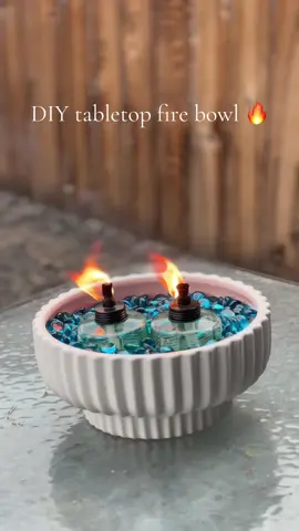 A post by @amberalejandrez on TikTok caption: DIY Tabletop Firepit 🔥 #firepit #DIY #outdoorpatio #tiktokfind #tiktokshop #amberalejandrez #dollartreefinds #walmartfinds 