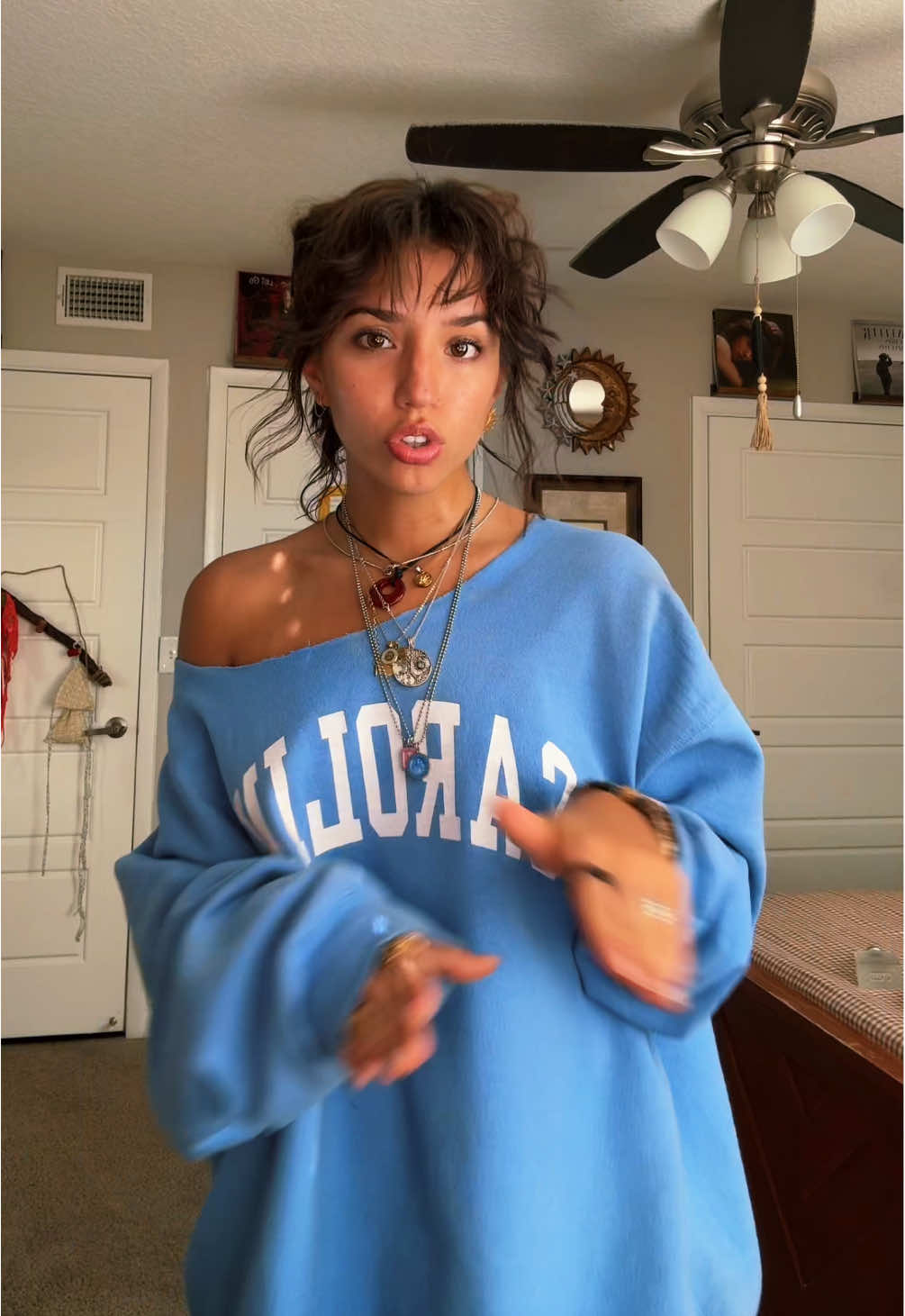 A post by @valeklinar on TikTok caption: Everyone shutuppp I THINK MY HAIR IS GETTING LONGER 🙂‍↕️ #justagirl #thrifted #shorthair #bangs #jewelry 