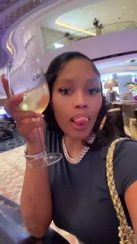 A post by @dollywrlds on TikTok caption: In Vegas at the bar telling people I got divorced now they giving me free drinks ☺️😭 #fyp 