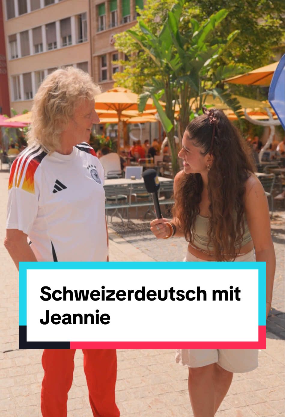 A post by @ on TikTok caption: ⚽🇨🇭 Jetzt wird’s ernst – und zwar sprachlich! @Jeannie ist wieder in der Schweiz unterwegs und stellt beim Lidl Stand die Fan Zone mit einem Dialekt-Ratespiel auf die Probe! Hättet ihr alles gewusst? 🤓 #WEURO2025 #neverstopgrowing #onyourteam #FemaleFootball #UEFA #lidlde #lidllohntsich #lidlch
