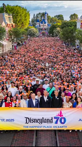 A post by @disneyparks on TikTok caption: A cast photo 70 years in the making ✨📷 #Disneyland70 #Disneyland #Disney #DisneyParks #DisneyCastMember #DisneyCastLife