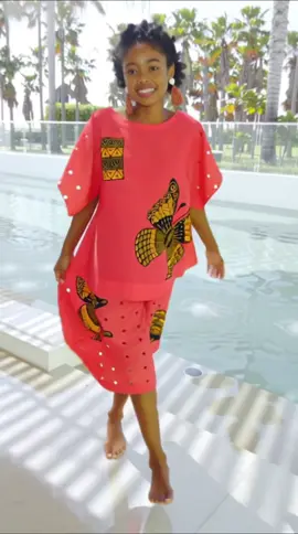 A post by @erikschaix on TikTok caption: Ensemble en lin et broderie anglaise coordonnée avec des inscriptions de pagne . Même à la piscine le pagne fait son effet . #paris #workshop #fashiondesigner #mode #couture #fashion 