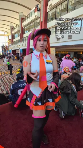 A post by @rufflebutt on TikTok caption: I can't believe I did this in public #cosplay #ctcon #connecticon #dunkinmiku #miku #mikuverse #mikucosplay