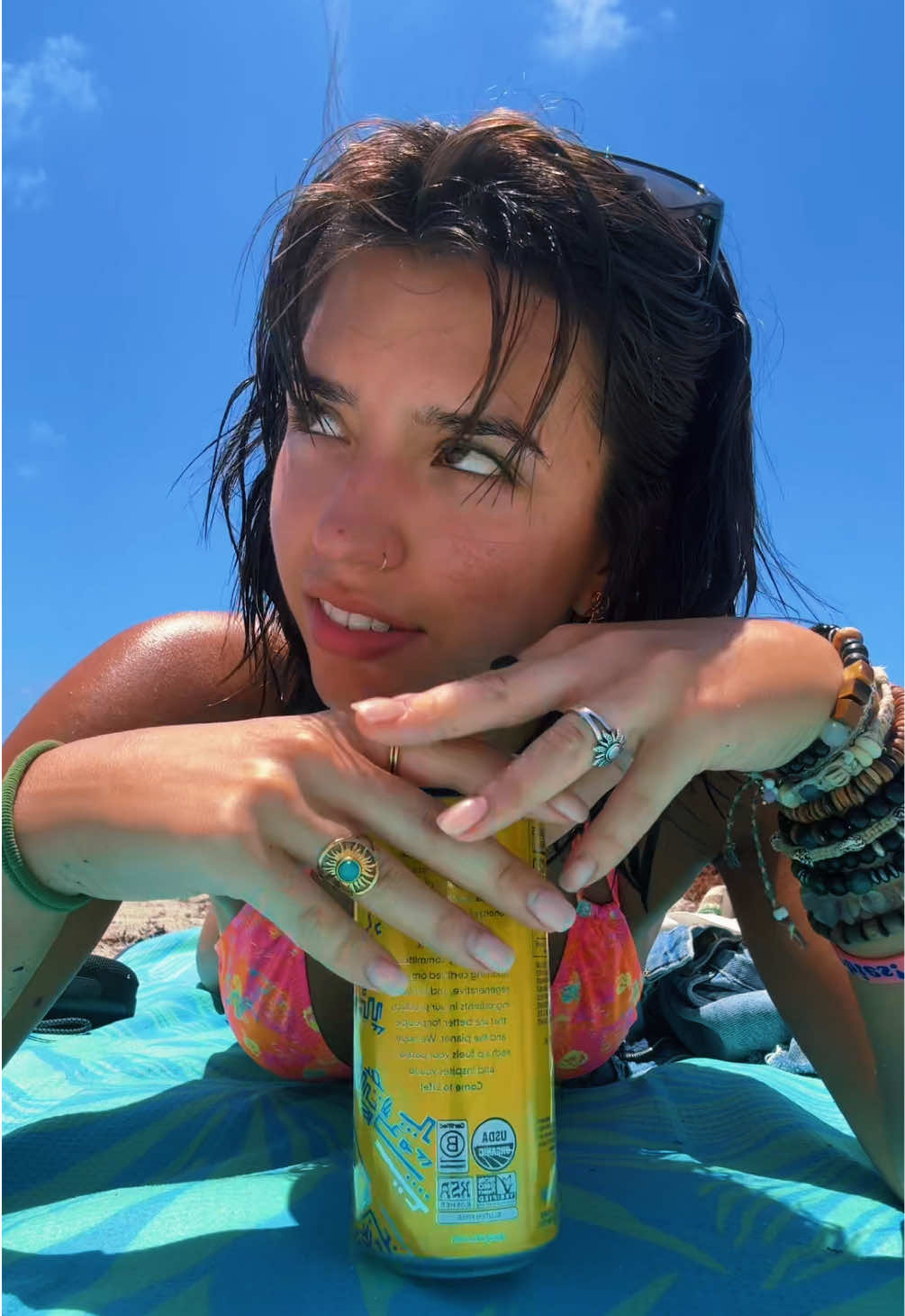 A post by @valeklinar on TikTok caption: There was so much seaweed in the water today it’s not even funny tbh 🧍‍♀️  #justagirl #beach #thrifted #shorthair #bangs #jewelry 