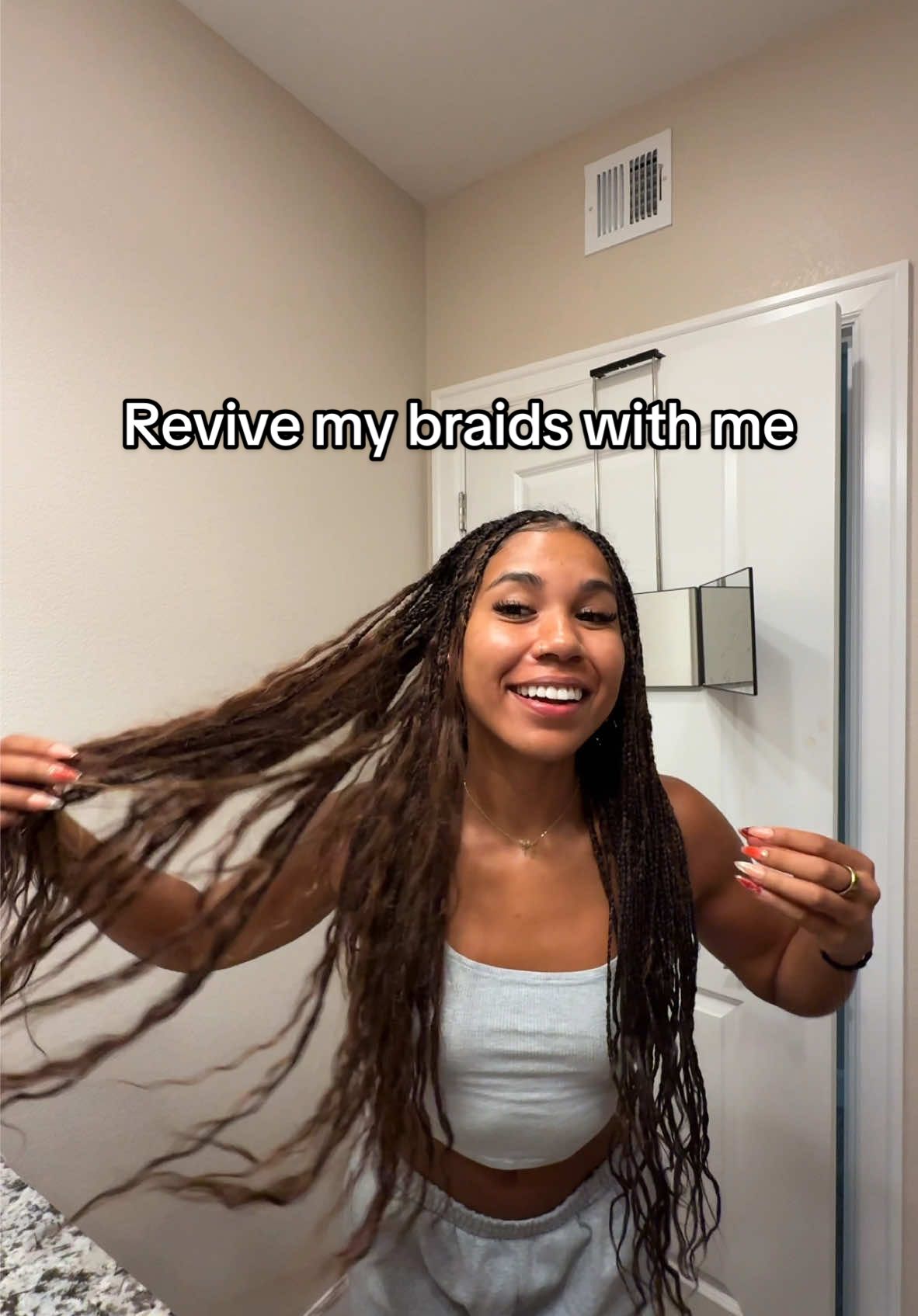 A post by @courtneysarracino on TikTok caption: Revive my braids with me😌🧚🏾‍♂️🤎✨ okay but I’m obsessed with this! What a fun little change💕 #braids #bohobraids #fulanibraids #knotlessbraids #hairtok #hairjourney #grwmhair #braids #braiding #hairstyle 
