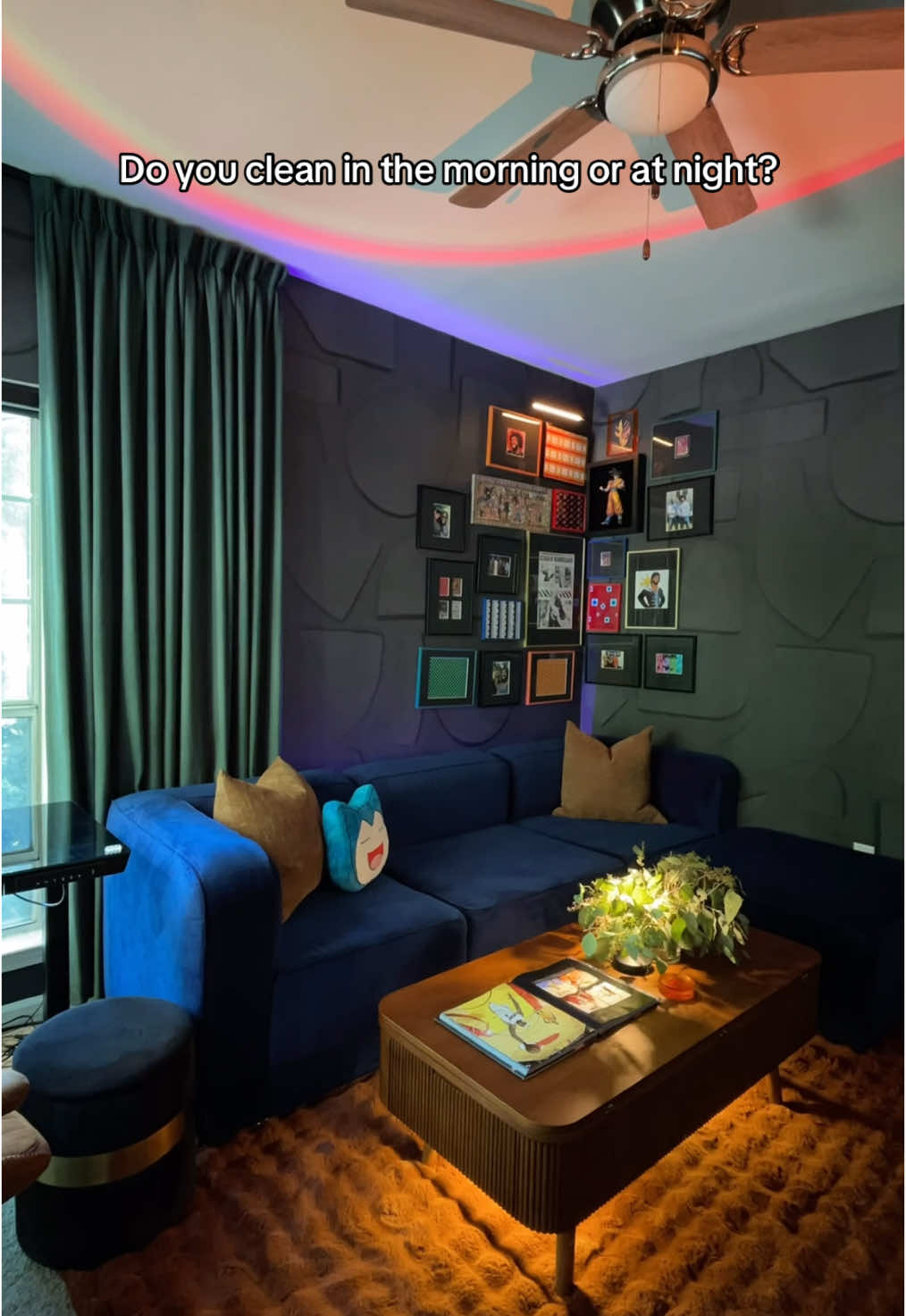 A post by @myuglyapartment on TikTok caption: #ApartmentMakeover #Mancavedecor #apartmentdecor #joybirdsofa #bluesofa #apartmentinspo #greencurtains #linencurtains #darkandmoodyaesthetic 