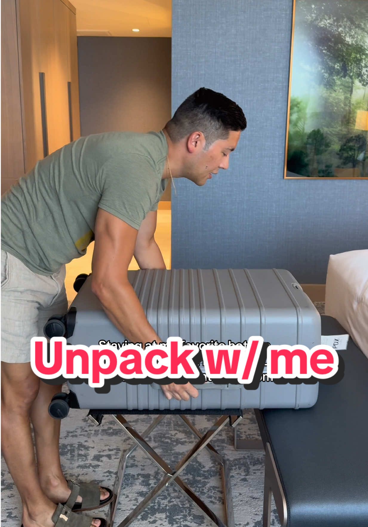 A post by @athomewithbryan on TikTok caption: All moved in 😌 #unpack #hotels #travellife #portland #athomewithbryan 