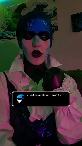 A post by @thewickedwarren on TikTok caption: Welcome home, NOELLE. 💻🔷️🖤 #deltarunecosplay #queencosplay #deltarune #tobyfox #undertale #deltarunechapter2 #queendeltarune 