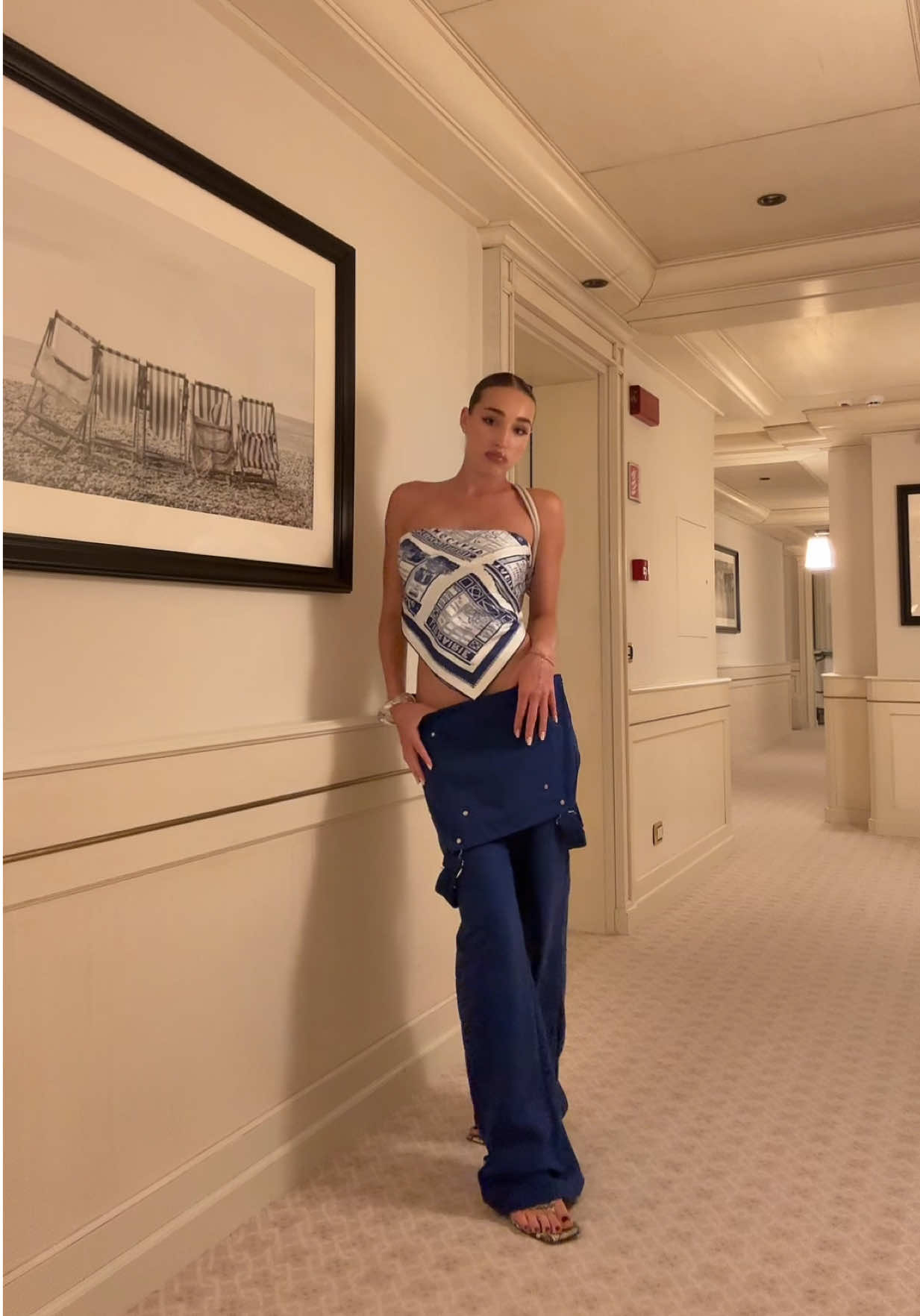 A post by @ginevramavilla on TikTok caption: serving construction couture 👷🏽‍♀️🔧🏗️🚧 @Longchamp 