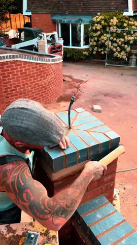 A post by @mahoneybrick on TikTok caption: Mitred pier cap 🧱 #birmingham #bricklayer #mahoney #bricklayers #bricks #mortar #construction #foryou #explore #follow #detail 