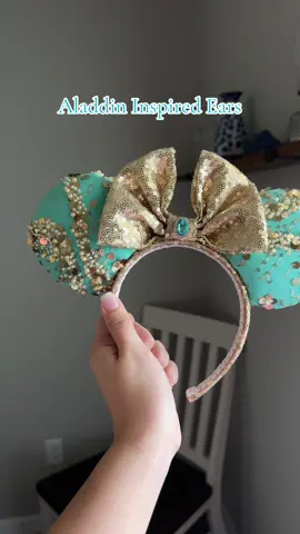 A post by @meganrodrig on TikTok caption: Best Aladdin variation I’ve done so far #disney #disneyland #disneyworld #disneyears #disneyearsdiy #aladdin #aladdinears #aladdindisneyears #jasmine #princessjasmine #jasmineears #jasminedisneyears #etsy #etsyshop #smallbusiness 