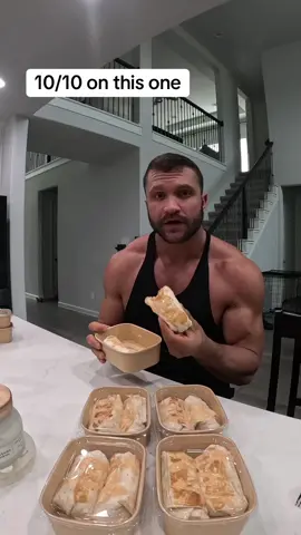 A post by @cookingforgains on TikTok caption: -253 calories 38g protein 6g fats 24g carbs for 1 OR -506 calories 76g protein 12g fats 48g carbs for 2  Directions ⬇️⬇️⬇️ -44 oz Chicken Breast seasoned with the following  - Garlic Salt - Onion Powder -Smoked paprika  I want you to go pretty heavy on the seasoning for flavor. Now you’re going to put the chicken into a bowl add 1/2 can of adobo peppers sauce and mix the chicken until it’s completely coated Now you’re going to add this into your air fryer temperature 375° for 20 minutes  while your chicken is cooking, go ahead and make your sauce and cook your bacon to save you some time . Sauce blend  1.5 Cup Cottage Cheese (0% Fat) 3/4 Cup Enchilada Sauce 2 adobo peppers Two spoonfuls of the adobo pepper sauce. Make sure they run this on high for a couple minutes you want the sauce to be very, very smooth  Cook up 10 strips of beef bacon super tasty for flavor and lower on fats  chop your chicken up chopper bacon up Put both into a big bowl now add -2 cups Cup Fat Free Mozzarella -your sauce mix then place the chicken mix into your tortillas evenly after….  I like to add a squirt of light sour cream to each burrito  I also enjoy some  some light ranch with wing sauce mixed together.  - 14 Low Calorie Tortillas 60 calorie extreme wellness  follow me for more high-protein ideas   My meal plans are on my page  Amazon storefront is on my page! Check my 🔗 #cookin#cooking##foods#Fitnesst#weightlosst#burritof#macrofriendlyr#highproteinr#mealprepn#cookingtiktokr#mealprepidease#chickens#fatlossn#cookingl#lowcalorie