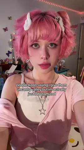 A post by @strawbabyboy on TikTok caption: stares at you with my neurodivergent eyes #femboy #fyp #femboytiktok #pink #kawaii #strawberry #fypシ #femboyfriday 
