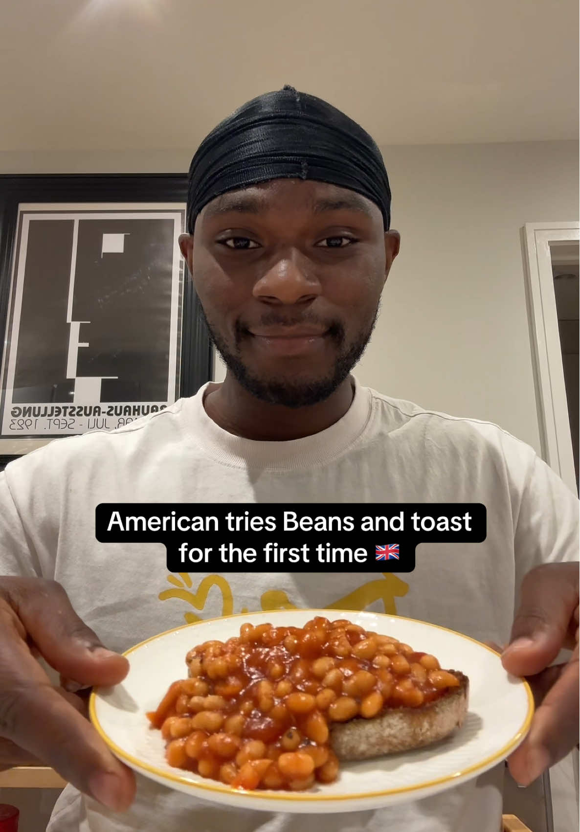 A post by @tyshonlawrence on TikTok caption: My uk followers were telling me to try bean and toast for the first time so here we go! 🇬🇧