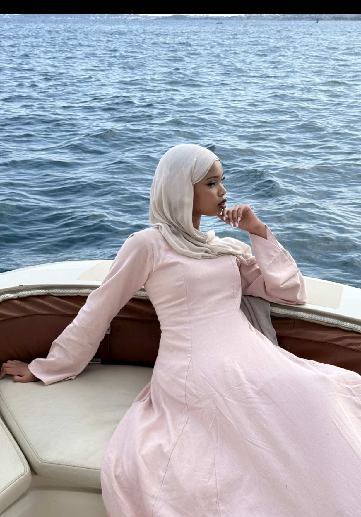 A post by @byhasanat on TikTok caption: Maybe life isn’t so bad🤷🏻‍♀️ Introducing our Linen dress in Powder Pink🎀 #modestfashion #hijab #modest #modestdress #nikkahdress #bridaldress #bridal     