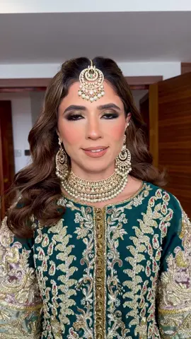 A post by @faizamakeupartistry on TikTok caption: Bridal makeover by me #bridalmakeup #bridalmakeupartist #bridallook #bridalglam #londonmua #ukmua #londonmakeupartist #bronzymakeup #smokeyeyes 