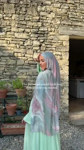 A post by @byhasanat on TikTok caption: Our iconic Pastel Flora modal hijab🌸✨ #modalhijab #modest #patternedhijab #modestdress #modestfashion #hijab #modeststyle 