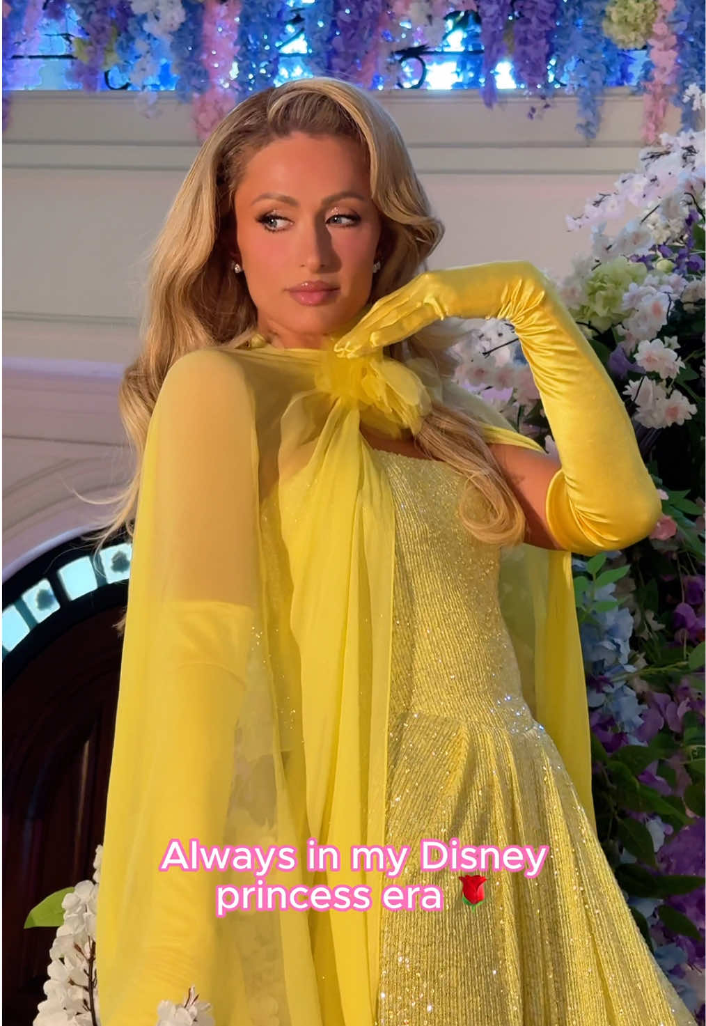 A post by @parishilton on TikTok caption: Always in my Disney Princess Era💛👸🏼🕯️✨ #ThatsHot ✨ #BeautyAndTheBeast 🌹
