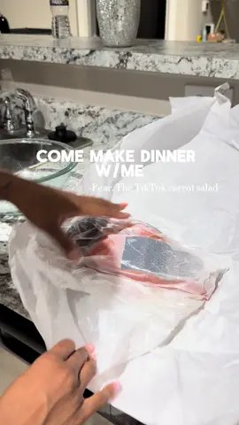 A post by @cocarney on TikTok caption: Salmon + that TikTok carrot salad = a whole vibe 🍽️🔥 Started with simple, flavorful ingredients for the salmon—olive oil, garlic powder, pepper, Cajun seasoning—mixed it up and tossed it in the air fryer. Then whipped up that spicy carrot salad (y’all know the one!) with minced garlic, onions, chili oil, chili pepper, sesame oil, and lots of rice vinegar. Paired it all with jasmine rice and… whew 😮‍💨 Bon Appétit, Chef’s Kiss 👩🏽‍🍳💋 Me and my babies eat really good over here 💕 Like, comment, and follow for more delicious, feel-good meals 🥰 #HomeChefVibes #SalmonDinner #TikTokCarrotSalad #BlackMomsCookToo #AirFryerMeals #FamilyEats