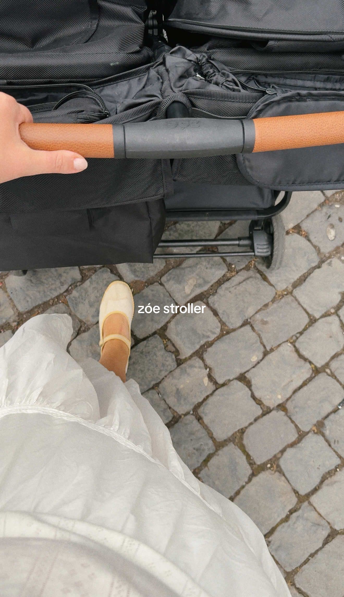 A post by @emilyfranciswheaton on TikTok caption: finally a double stroller I can get behind!! #zoestroller #zoetwin #doublestroller #travelstroller #momoftwo @Zoe 