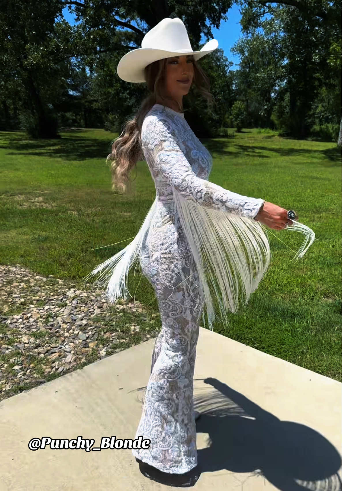 A post by @punchy_blonde on TikTok caption: Bride must have✨ #shoppunchyblonde #westernbride #westernwedding #bacheloretteoutfit #receptionlook 