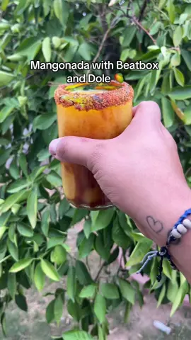 A post by @ssserg_ on TikTok caption: @BeatBox Beverages🧃 and @Dole Packaged Foods Mangonada 🔥 perfect for this summer heat 🥵 #drinktok #drinks #mangonada #summerdrinks 
