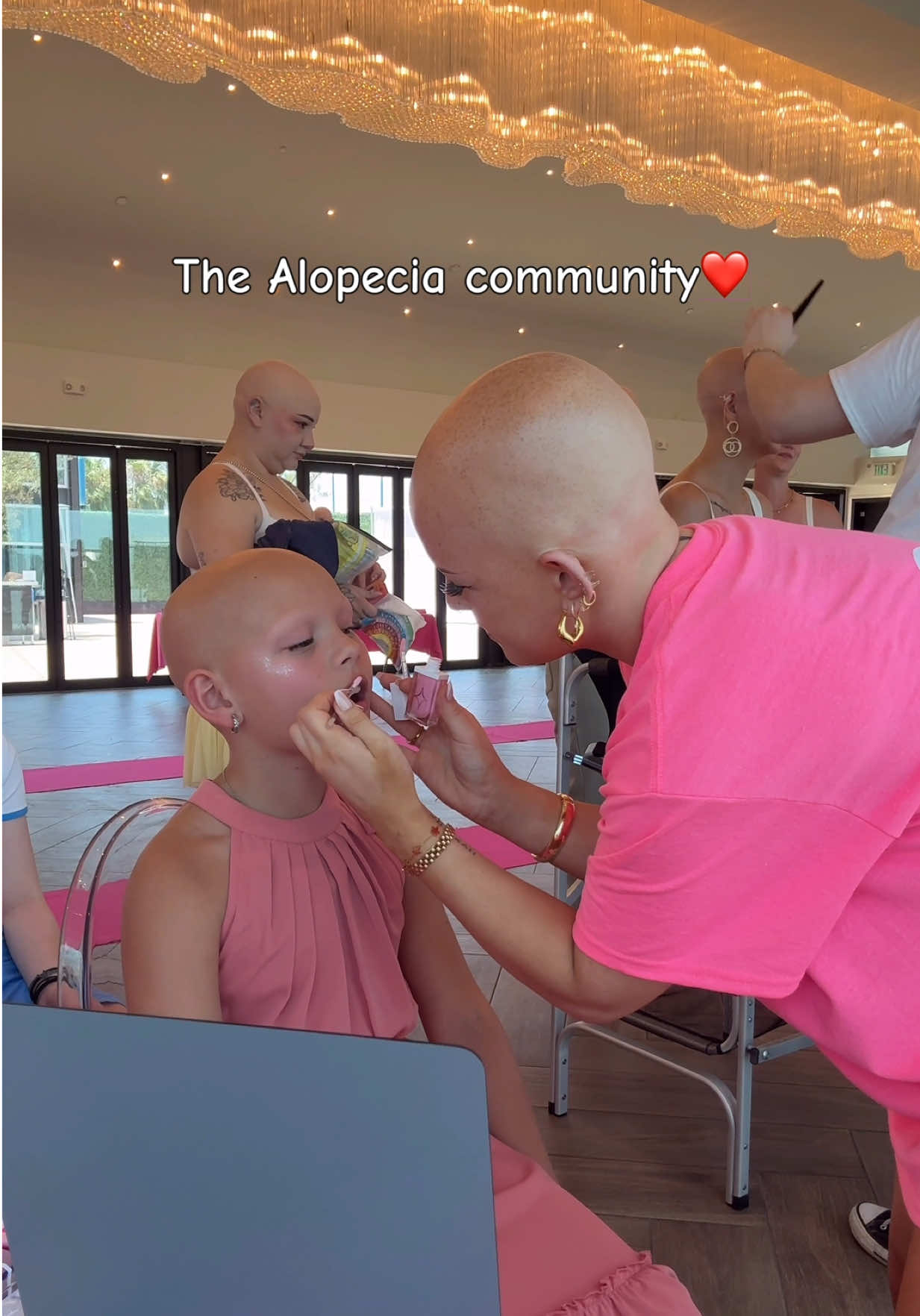 A post by @ on TikTok caption: Alopecia Awareness 🩵 I LOVE YOU GUYS @The Baldtourage @L’Oréal Paris  #alopecia #alopeciaawareness #bald #hairloss #wigs 
