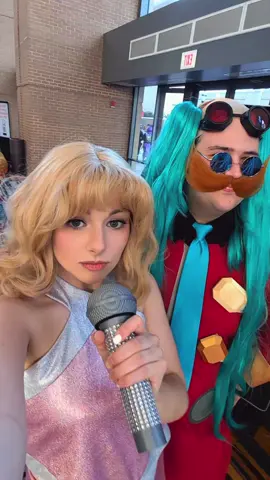 A post by @rufflebutt on TikTok caption: besties tell each other everything 😁 🫶 #connecticon #cosplay #ctcon #sonic #sabrinacarpenter #eggman #shadowthehedgehog 