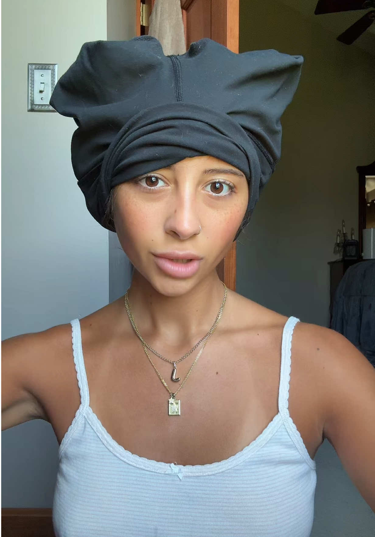 A post by @annaappetizer on TikTok caption: honestly i don’t hate the result it’s just so frizzy eeeeee !! one day i will master legging curls but if anyone has tips please help a girl out 🙈 #heatlesscurls #leggingcurls #hairtok 