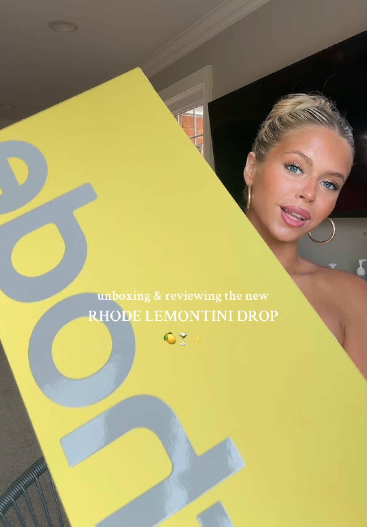 A post by @nats_not_okay on TikTok caption: trying the new Rhode lemontini summer drop🍋🍸✨ tysm @rhode skin 💛💛💛 @Hailey Bieber #rhode #lemontinisummer #peptideliptint #summermakeup #glowymakeup #makeupinspo 