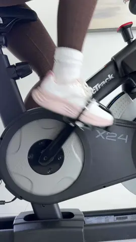 A post by @avbfit on TikTok caption: Used to think cardio had to look a certain way to count… StairMaster. Incline walking. Dripping sweat. Or else it wouldnt work But movement doesn’t have to feel like punishment to be effective. You’re allowed to enjoy the process and get results.  Luckily this @NordicTrack x24 bike has been the reminder I didnt know I needed lately🤍 (@iFIT membership not included) #SponsoredbyNordicTrack #cardio #cardioroutine #cycling