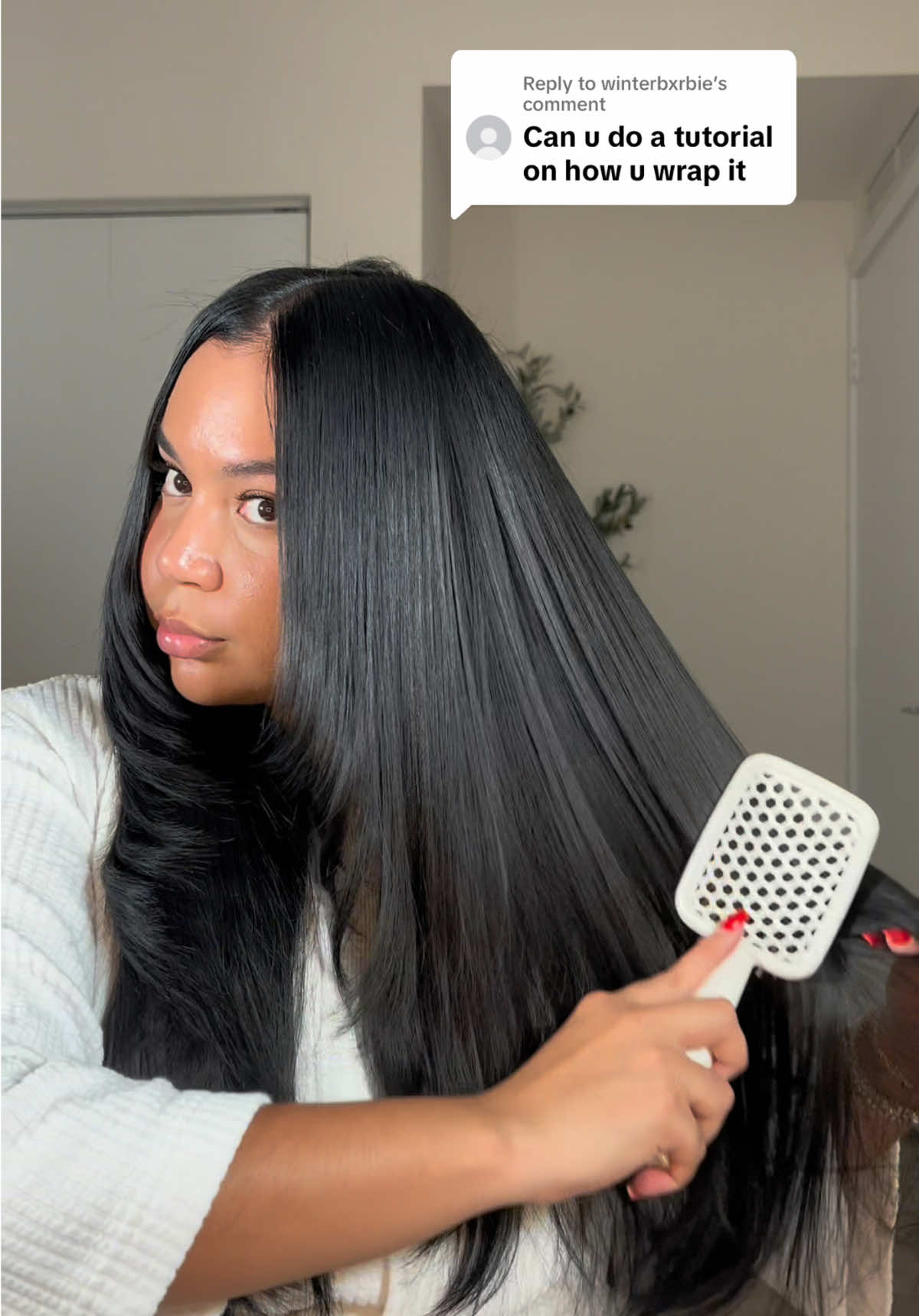 A post by @ on TikTok caption: Replying to @winterbxrbie this is how I do my tubi hairwrap - hope this helps 🫶🏽 the more you practice the easier it gets and you can use pins to hold your hair as you go and then remove them once your done since the tubi wrap has little holes ❤️ #hairtok #healthyhair #tubi #hairwrap #longhair #dominicantubi #dominicanhairwrap #shinyhair 