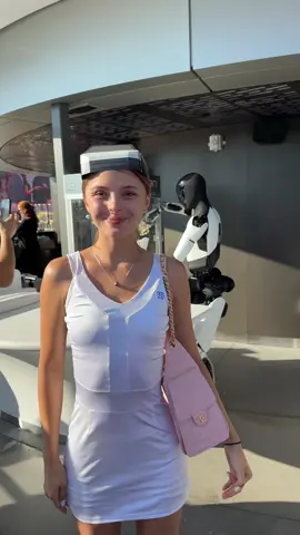 A post by @odarkakom on TikTok caption: Tesla Optimus is so cute 🥹💋